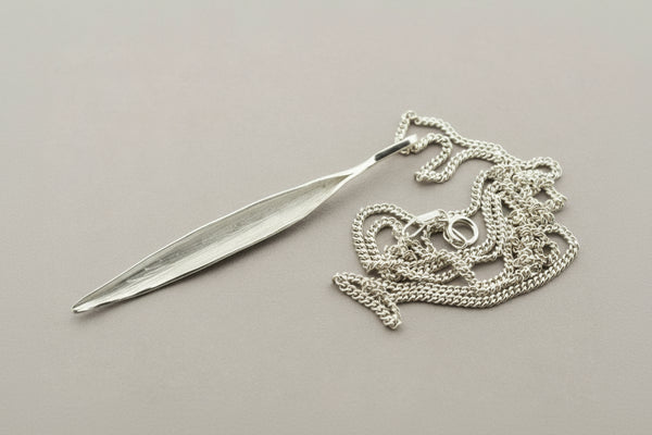 Long tea leaf pendant on 55cm link chain - silver