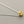 Load image into Gallery viewer, Necklace with a gold pendant on a gray background
