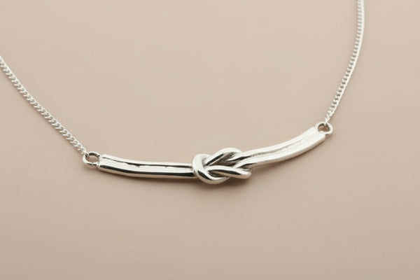 Silver reef knot necklace - sterling silver