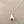 Load image into Gallery viewer, Silver teardrop pendant necklace on a gray background
