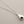 Load image into Gallery viewer, Silver necklace with a teardrop-shaped pendant on a gray background
