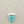 Load image into Gallery viewer, Turquoise triangle pendant necklace on a gray background

