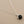 Load image into Gallery viewer, Necklace with a hexagonal black pendant on a gray background
