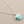 Load image into Gallery viewer, Turquoise pendant necklace on a gray background
