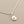 Load image into Gallery viewer, Silver necklace with a pendant on a gray background

