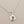 Load image into Gallery viewer, Silver necklace with a pendant on a gray background
