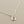 Load image into Gallery viewer, Silver necklace with a pendant on a gray background
