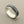 Load image into Gallery viewer, Silver ring with black stripes on a gray background
