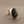 Load image into Gallery viewer, Silver ring with a green stone on a gray surface
