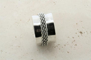 Concave band w woven spinner ring - Makers & Providers