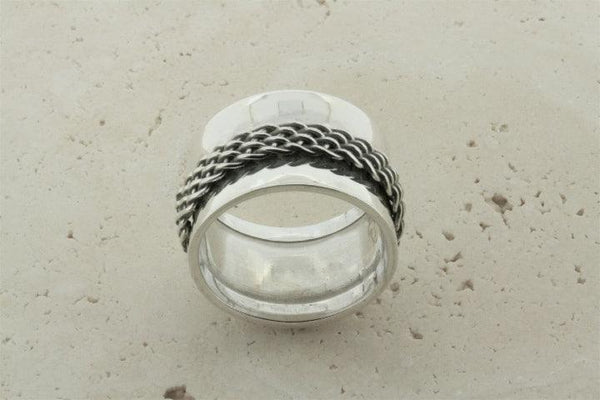 Concave band w woven spinner ring - Makers & Providers