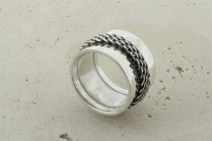 Concave band w woven spinner ring - Makers & Providers