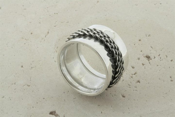 Concave band w woven spinner ring - Makers & Providers