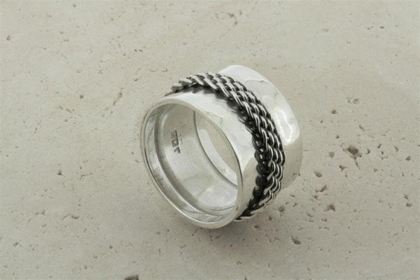 Concave band w woven spinner ring - Makers & Providers