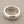 Load image into Gallery viewer, Silver ring with a textured surface on a gray background
