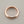 Load image into Gallery viewer, Rose gold ring on a gray background
