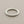 Load image into Gallery viewer, Silver twisted ring on a gray background
