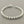 Load image into Gallery viewer, Silver bracelet on a gray background
