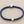 Load image into Gallery viewer, Blue beaded bracelet with a silver clasp on a gray background
