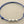 Load image into Gallery viewer, Blue cord bracelet with three silver beads on a gray background
