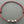 Load image into Gallery viewer, Red string bracelet with three silver beads on a gray background
