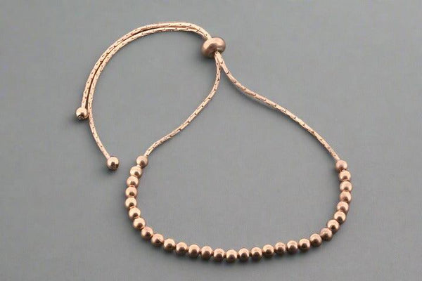 Multi round bead bracelet - rose gold over silver - Makers & Providers