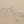 Load image into Gallery viewer, Silver branch-like earrings on a dark gray background
