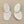 Load image into Gallery viewer, Pair of silver earrings on a gray background
