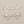 Load image into Gallery viewer, Silver floral earrings on a gray background
