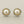 Load image into Gallery viewer, Silver earrings with pearls on a gray surface
