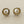 Load image into Gallery viewer, Pair of pearl stud earrings on a gray background
