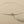Load image into Gallery viewer, Necklace with tassel on a gray background
