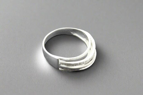 silver crossover ring - Makers & Providers