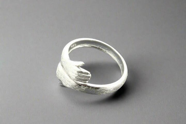 Silver hug ring - Makers & Providers