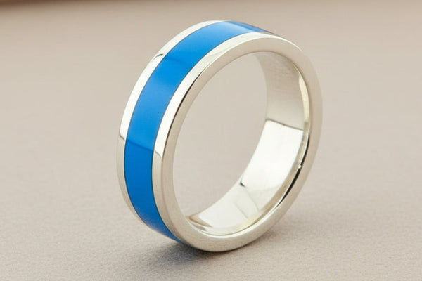 Silver ring with blue resin insert