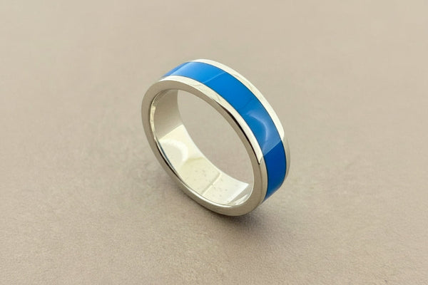 Silver ring with blue resin insert