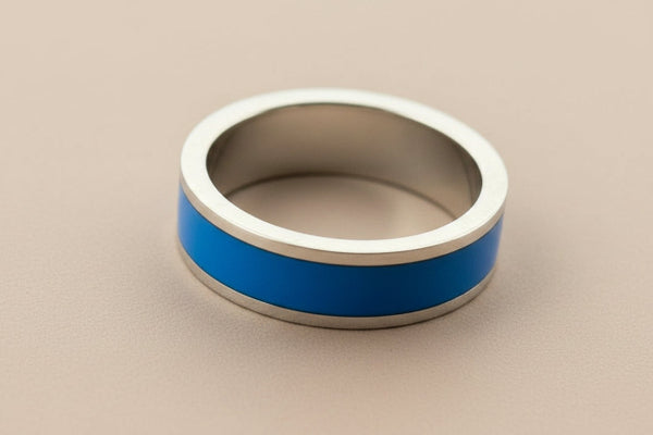 Silver ring with blue resin insert