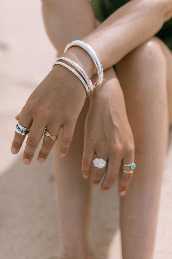 circular battered tubular bangle - sterling silver - Makers & Providers