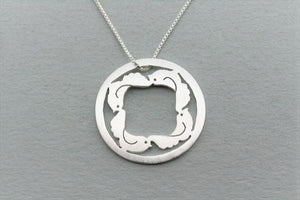 4 cute birds form a circle in this pendant necklace