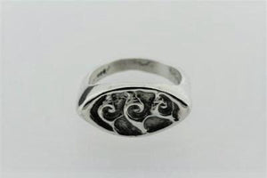 silver signet ring with tribal detail