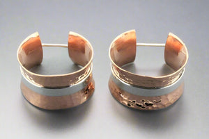 concave battered copper hoop with silver band - Makers & Providers