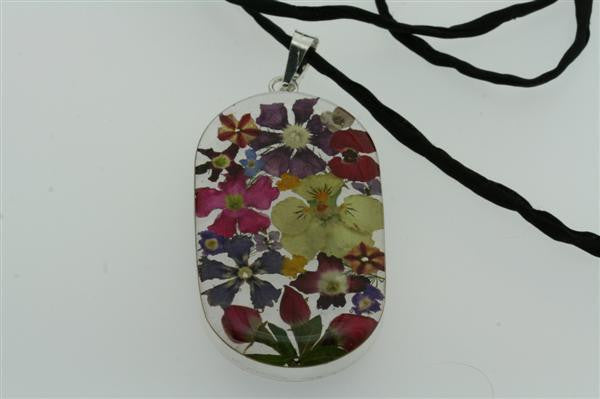 flower/resin pendant - cylinde on black silk - Makers & Providers