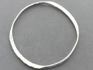 Hammered flattened bangle - pure silver - Makers & Providers
