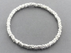 irregular disc bead stacked bangle - sterling silver - Makers & Providers