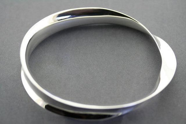 twisted concave bangle - sterling silver - Makers & Providers