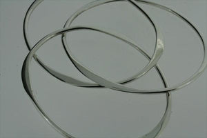 3 interlinked flattened oval bangle - sterling silver - Makers & Providers