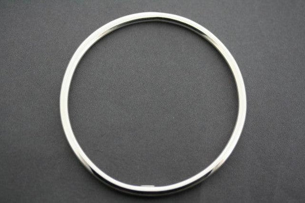Narrow tubular circle bangle - sterling silver - Makers & Providers