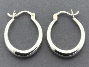 tapering hoop - polished silver - Makers & Providers