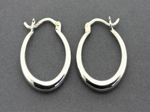 tapering hoop - polished silver - Makers & Providers