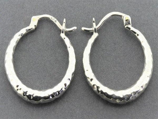tapering hoop - hammered silver - Makers & Providers
